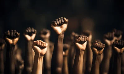 232506603-fists-raised-for-equality